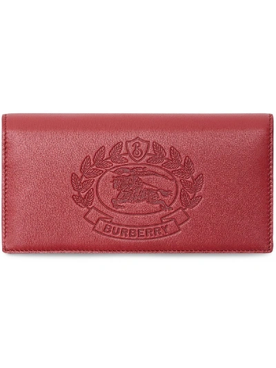 Burberry Embossed Crest Leather Continental Wallet In Pink