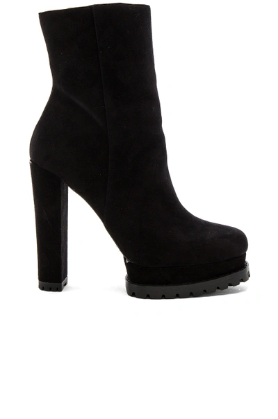 Alice And Olivia Holden Platformsheep Fur Lined Boot In 黑色 | ModeSens