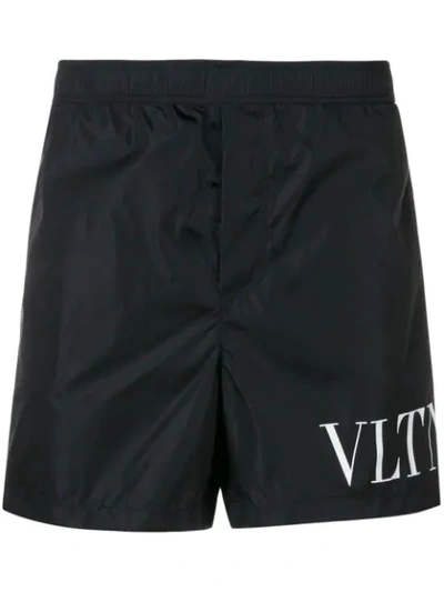 Valentino Vltn Logo Printed Swim Shorts In Black