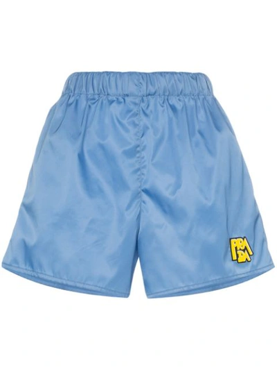 Prada Logo-patch Nylon Shorts In Pervinca