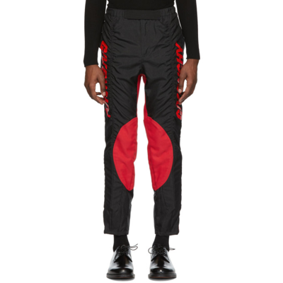 Givenchy Track Style Logo Trousers In Black