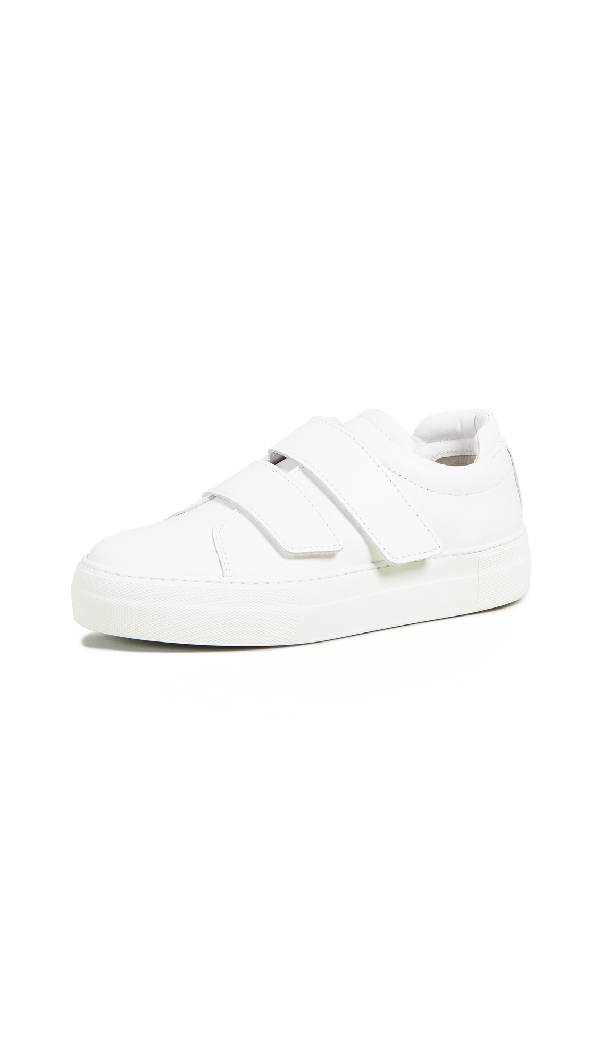 white velcro strap sneakers