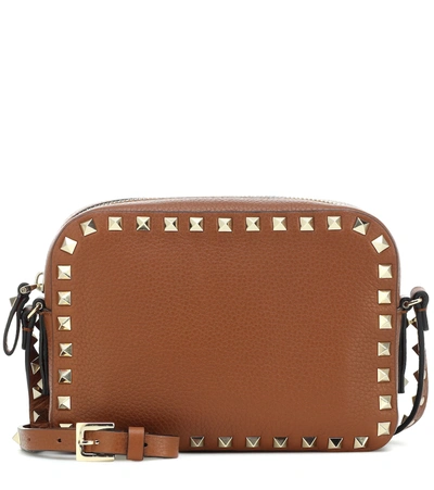 Valentino Garavani Rockstud Leather Crossbody Bag In Brown