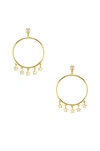 Shashi Star Dangle Hoop Earrings In Metallic Gold.