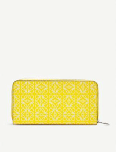 Loewe Anagram Embossed Logo Leather Wallet In Yellow/white