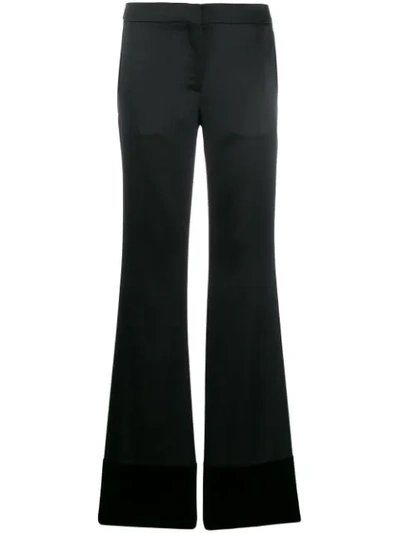 Moschino High-rise Flared Trousers In Black