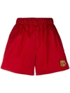 Prada Logo Patch Shorts In Red