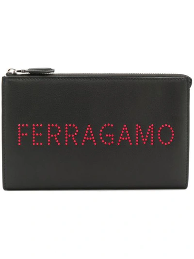 Ferragamo Logo Studded Clutch Bag In Black