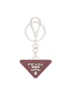 Prada Triangular Logo Keyring In Red