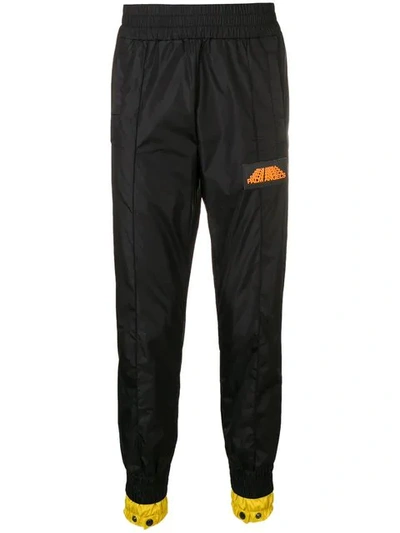Palm Angels Slim Fit Tapered Track Trousers In Black