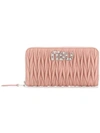 Miu Miu Matelassé Zipped Wallet In Pink