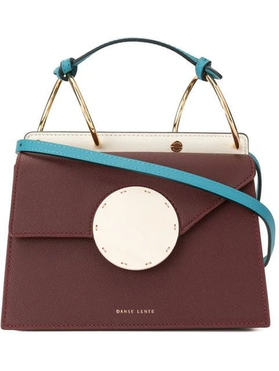 Danse Lente Round Lock Crossbody Bag In Purple