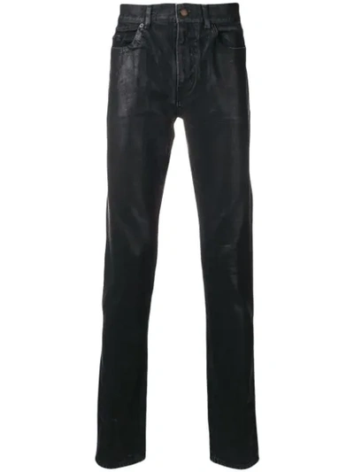 Saint Laurent Wax Coated Skinny Jeans In Black