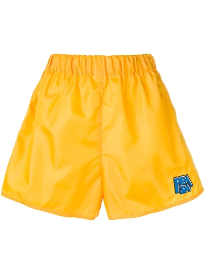 Prada Logo Shorts In Yellow