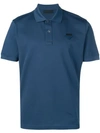 Prada Patch Embellished Polo Shirt In Blue