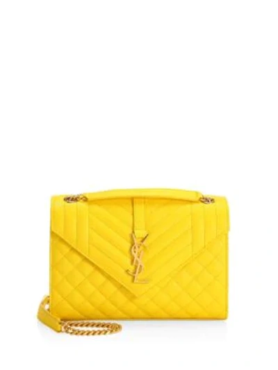 Saint Laurent Medium Embossed Leather Envelope Bag In Yellow