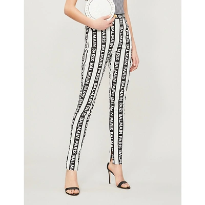 Balmain Logo-striped High-rise Skinny Cotton-blend Trousers In Black White