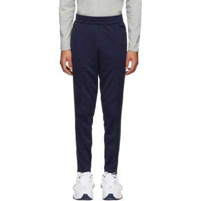 Nike + Martine Rose Tapered Striped Tech-jersey Track Pants In 416blu