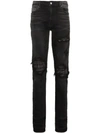 Amiri Slim-fit Distressed Cotton And Leather Jeans In 101 - Black