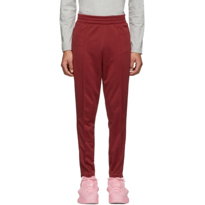 Nike + Martine Rose Tapered Tech-jersey Track Pants In 677tmred