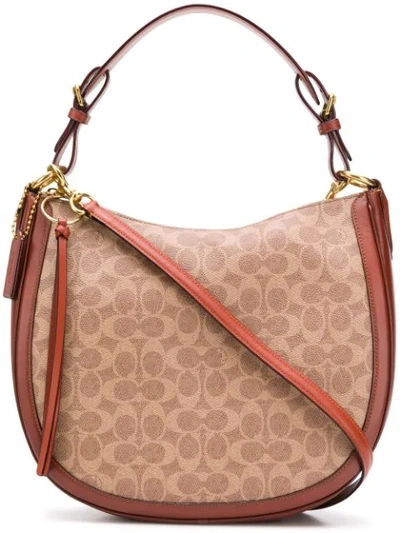 Coach Coated Canvas Signature Sutton Hobo Bag In Brown Canvas In Tan/rust/brass