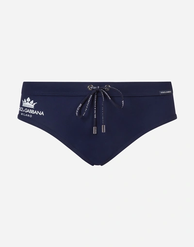 Dolce & Gabbana Swimming Briefs With Crown Print And Pouch Bag In Blue