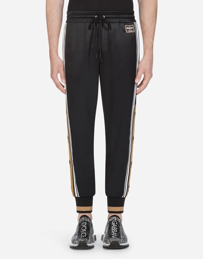 Dolce & Gabbana Satin Jogging Pants With Patch In Black