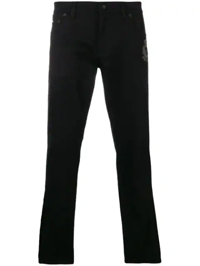 Dolce & Gabbana Low Rise Side Stripe Jeans In Black