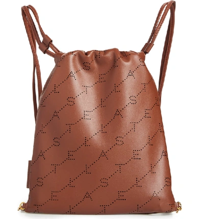 Stella Mccartney Perforated Logo Mini Faux Leather Drawstring Backpack - Brown In Cinnamon