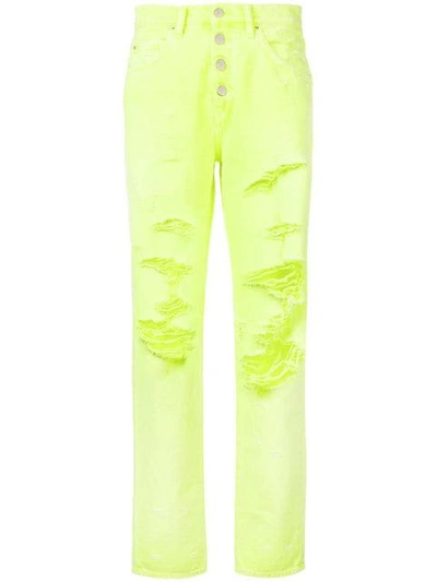 Amiri Distressed Slouch Jeans In Yellow