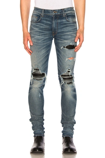 Amiri Mx1 Distressed Leather-panel Slim-leg Jeans In Black