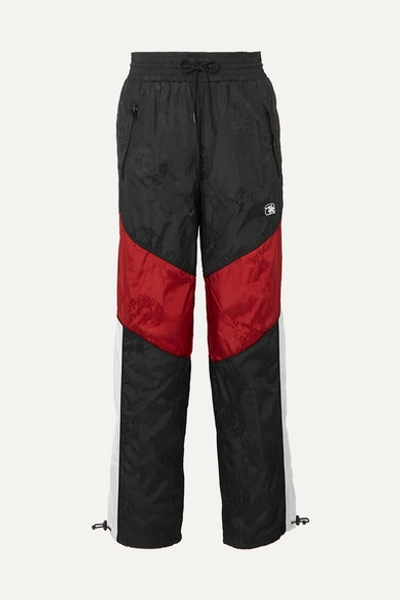 Alexander Wang Paneled Embroidered Shell-jacquard Track Pants In Black