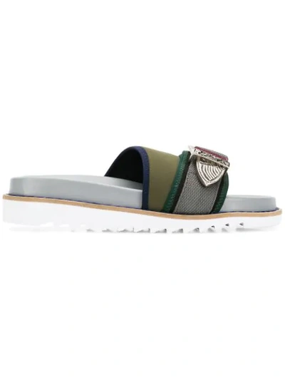 Toga Buckle Embellished Slides In Grey