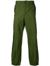 Prada Logo Cuff Trousers In Green