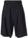 Yoshiokubo Tuck Shorts In Blue