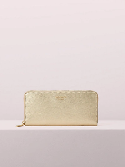 Kate Spade Sylvia Slim Continental Wallet In Pale Gold