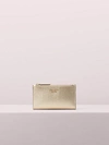 Kate Spade Sylvia Small Slim Bifold Wallet In Pale Gold
