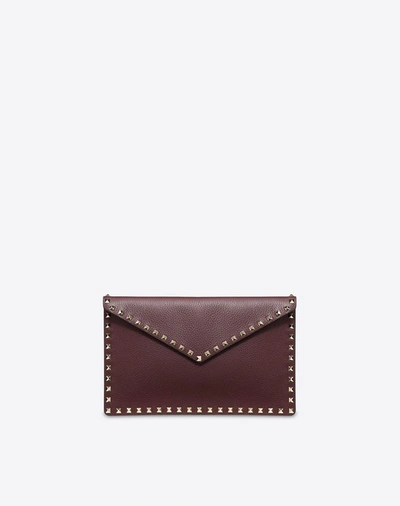 Valentino Garavani Rockstud Grainy Calfskin Pouch In Ruby