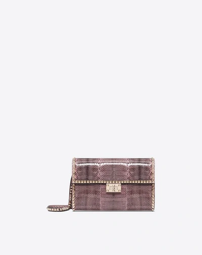 Valentino Garavani Ayers Leather Rockstud No Limit Clutch In Pastel Pink