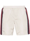 Gucci Logo-tape Relaxed-fit Swim Shorts In Cream