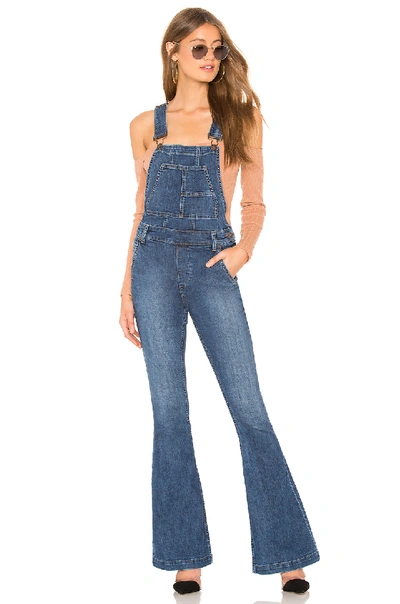 Free People Carly Flared Denim Overalls In Blue