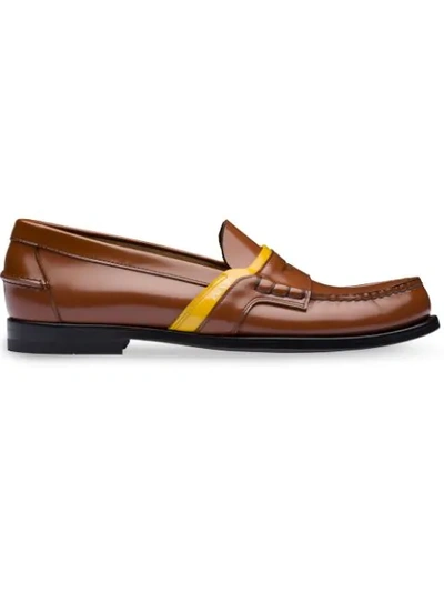 Prada Logo-saddle Leather Penny Loafers In Brown
