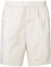 Gucci Gg Supreme Trimmed Shorts In Neutrals