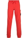 Stone Island Coral Sweatpants In Red