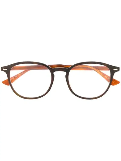 Gucci Oval Frame Glasses In Brown