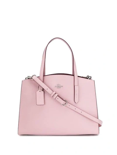 Coach Charlie Carryall In Pink