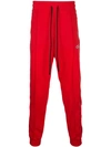 Amiri Side Leather Stripe Track Pants In Red