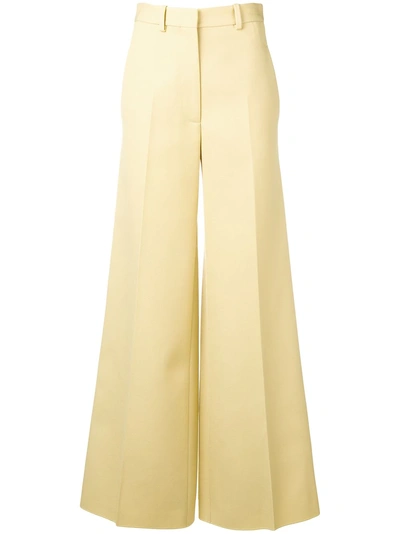 Victoria Beckham Flared Tailored Trousers In Yellow