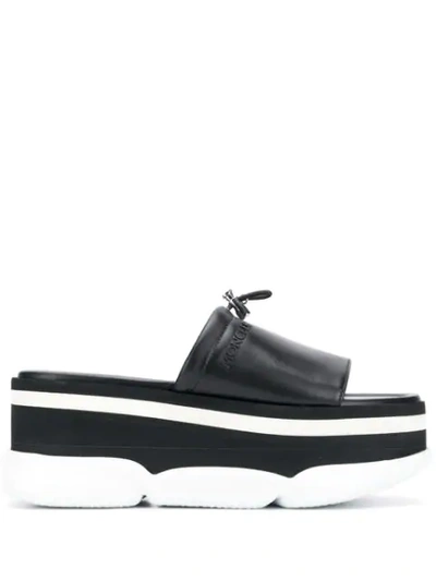 Moncler Flat Mules In Black