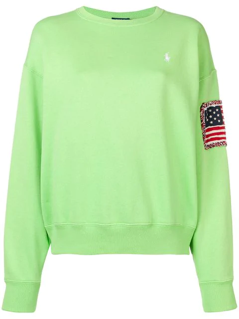 green polo sweater